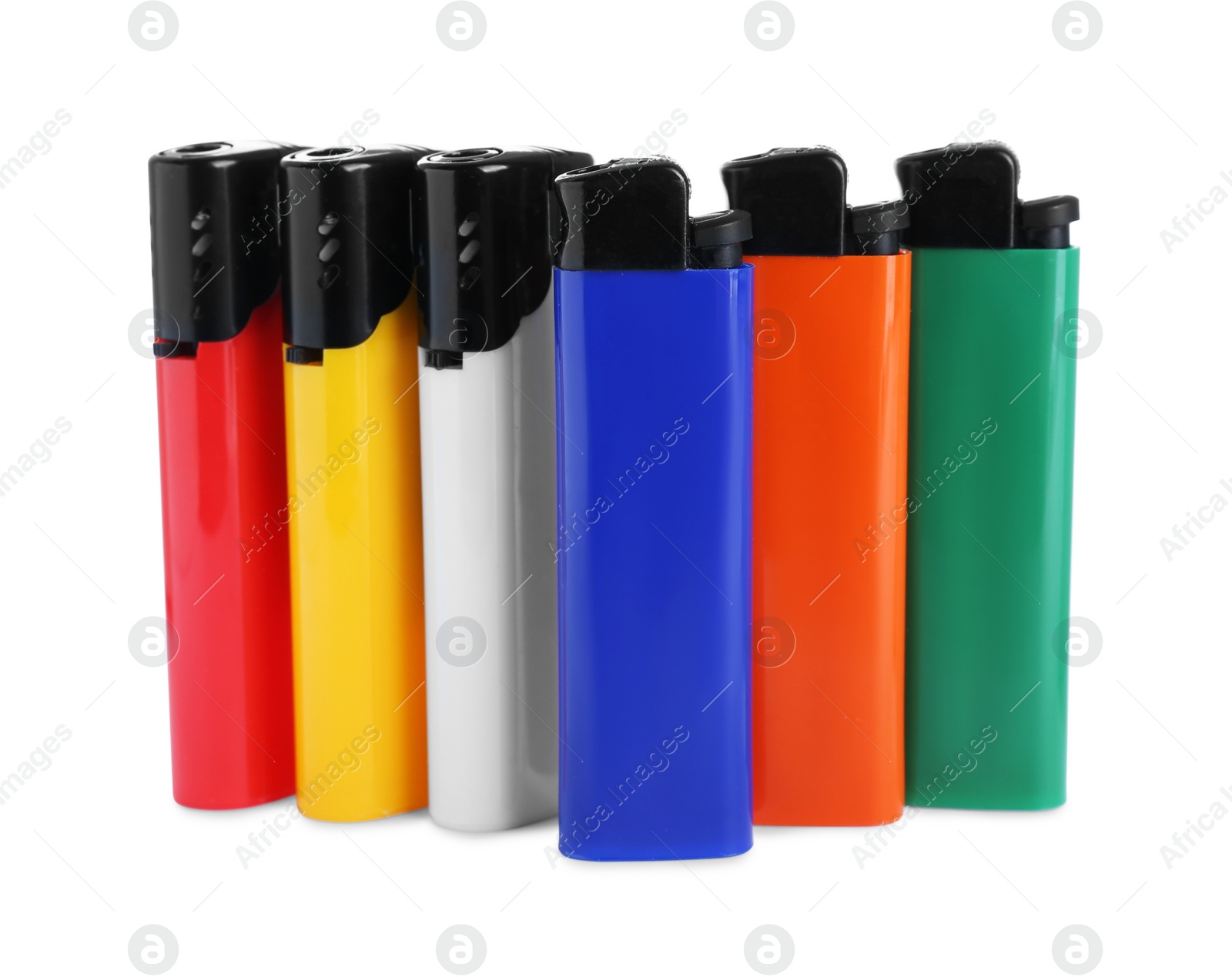 Photo of Stylish small pocket lighters on white background