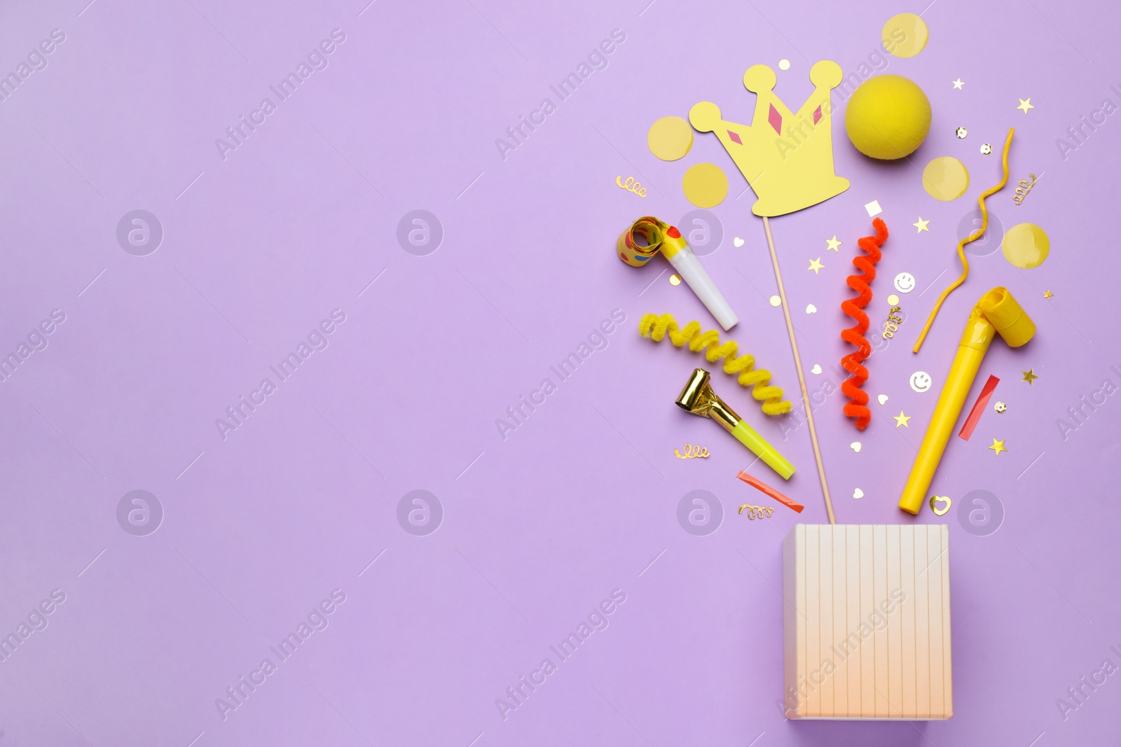 Photo of Flat lay composition with party items on pale violet background, space for text