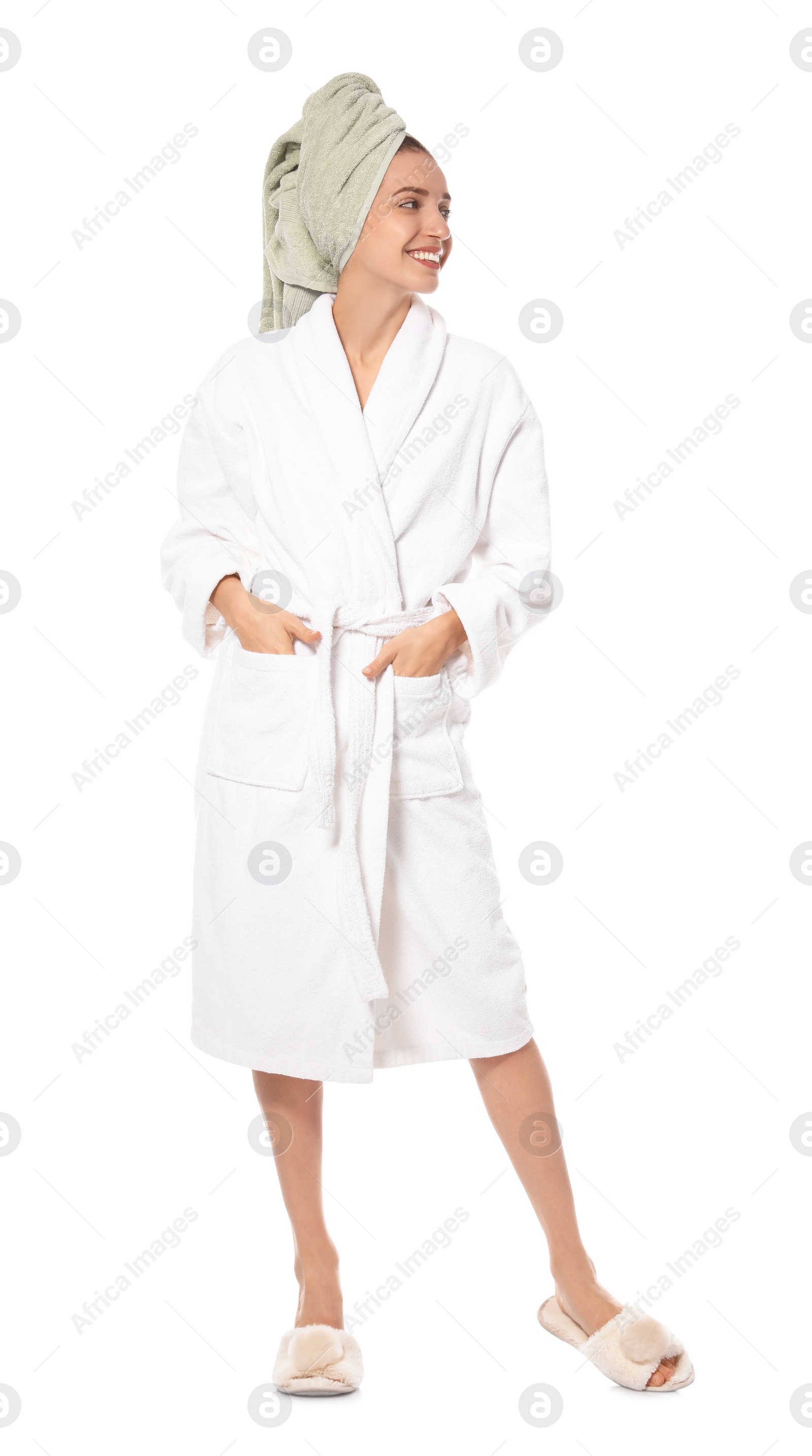 Photo of Beautiful young woman wearing bathrobe on white background