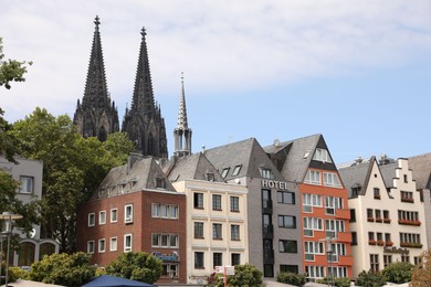 Cologne, Germany - August 28, 2022: Beautiful residential buildings on city street