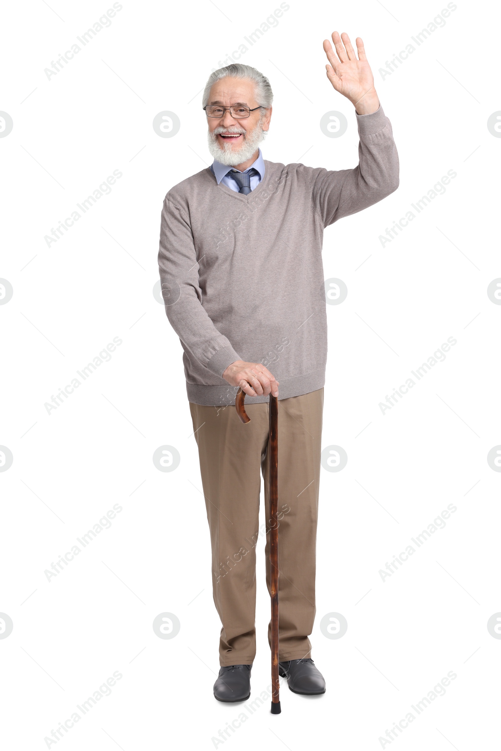 Photo of Senior man with walking cane waving on white background