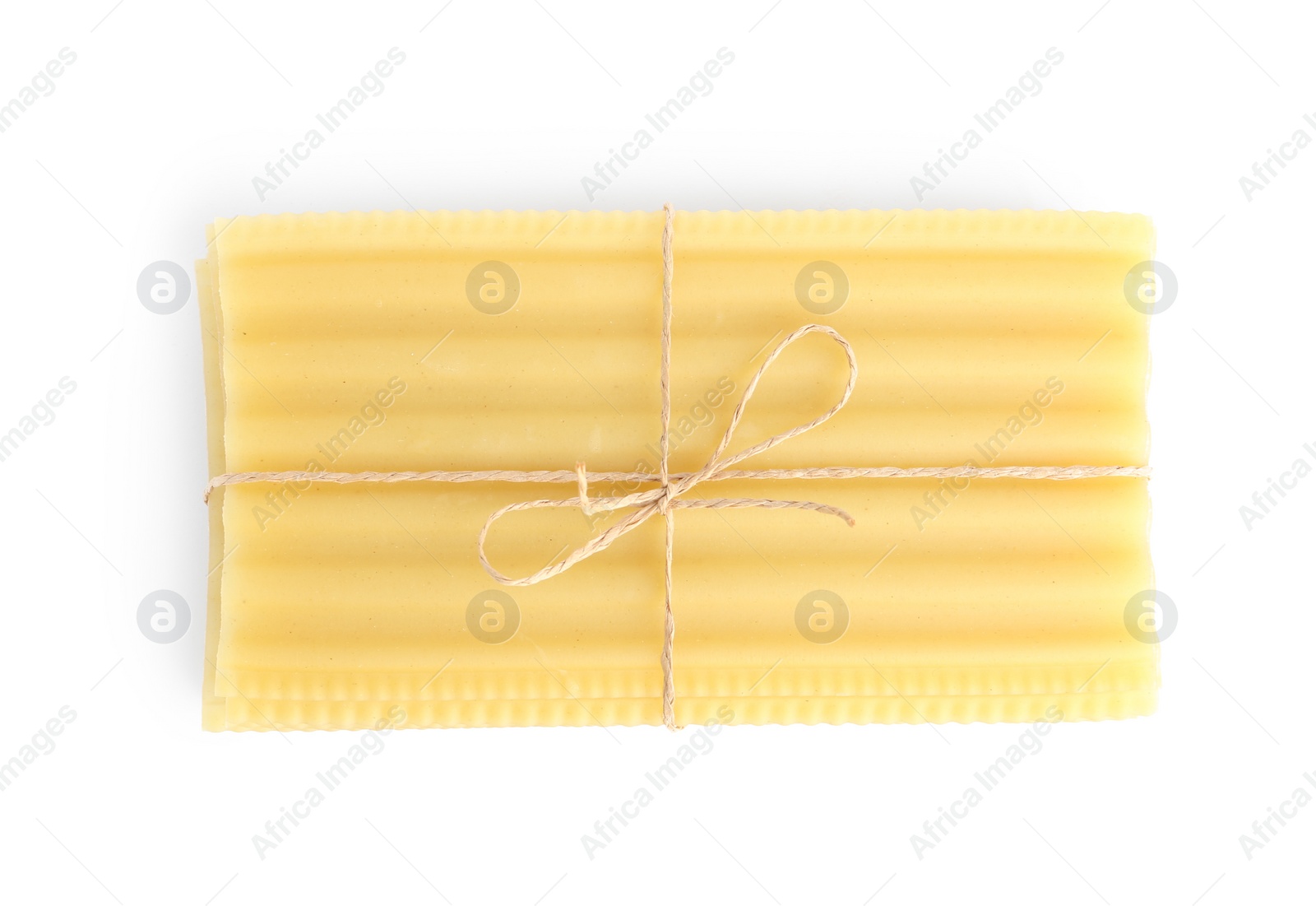 Photo of Uncooked lasagna sheets isolated on white, top view