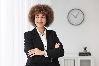 Portrait of beautiful female notary in office