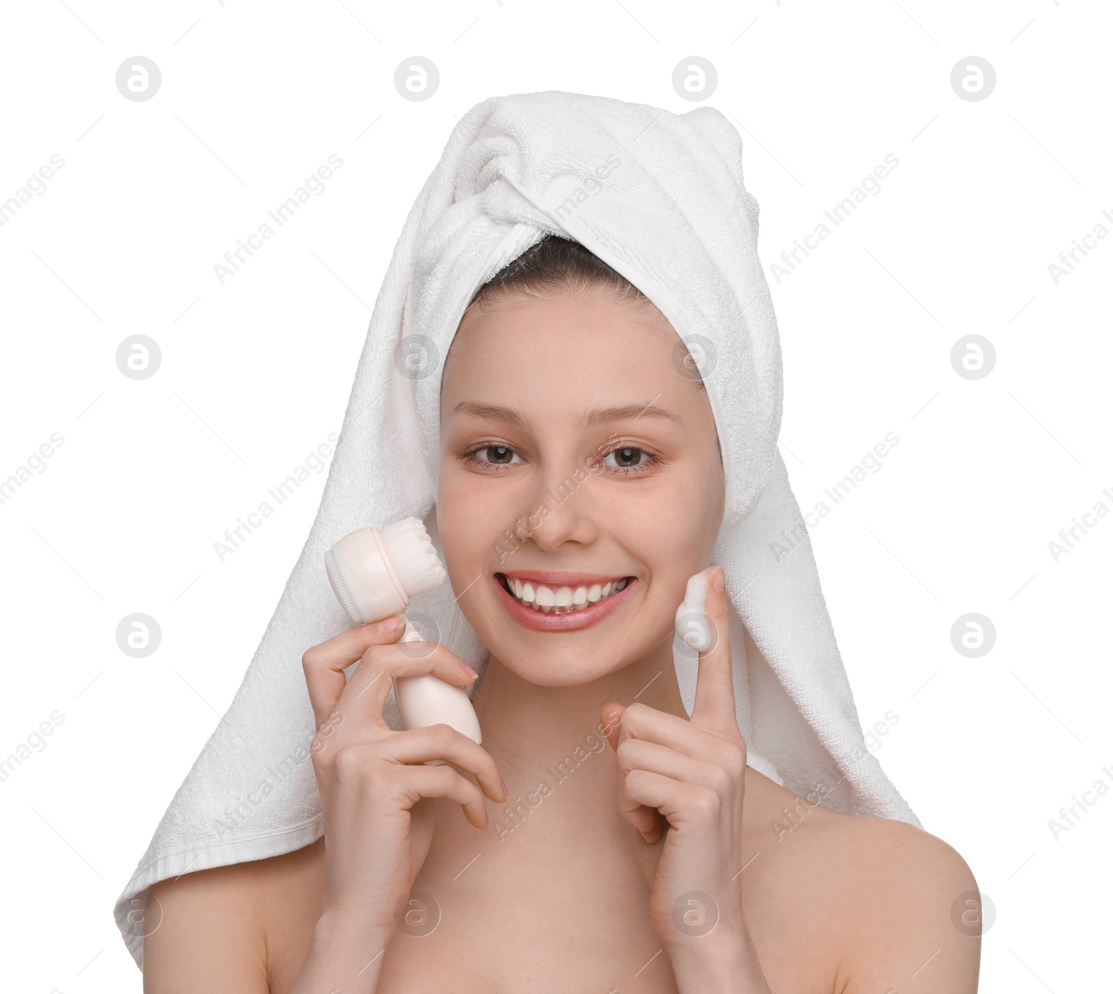 Photo of Washing face. Young woman with brush and cleansing foam on white background