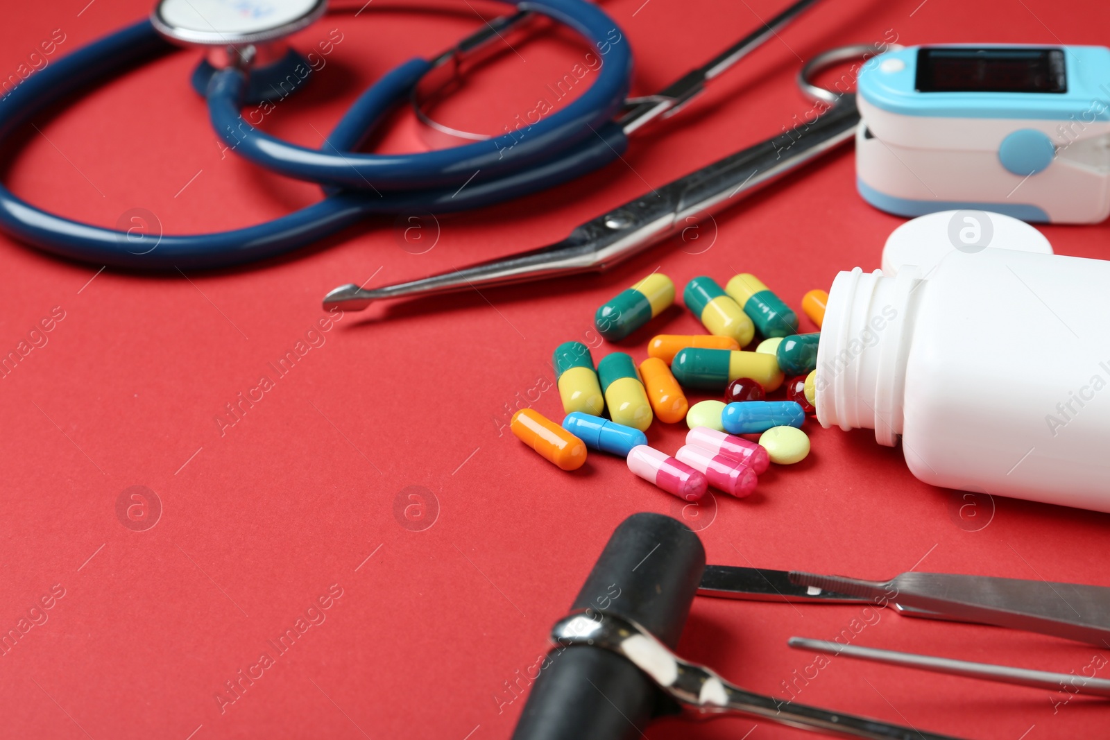 Photo of Different medical objects on color background, closeup