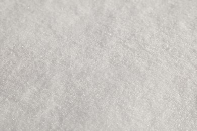 Clear white snow as background, closeup. Winter season