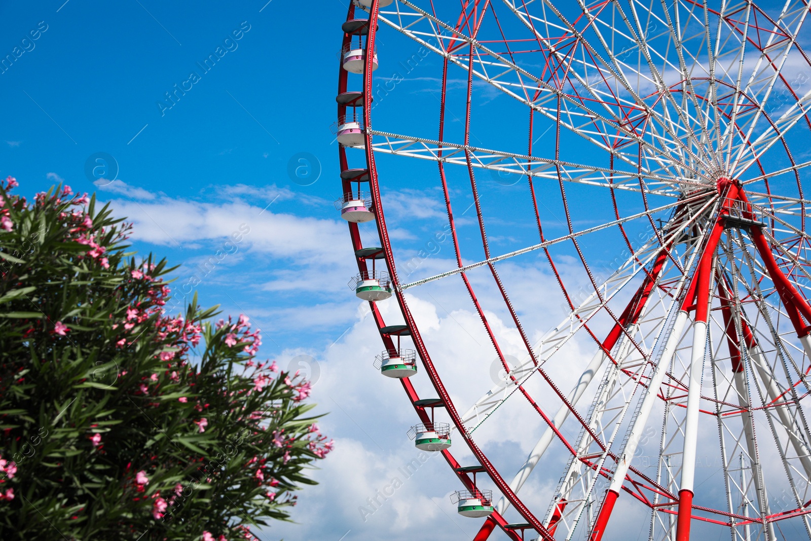 Photo of Beautiful large Ferris wheel outdoors on sunny day