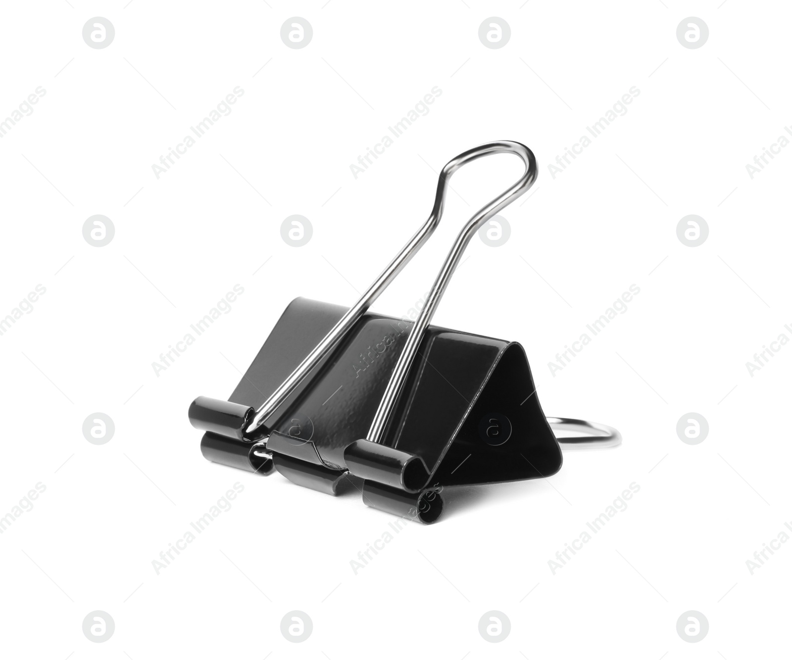 Photo of Black binder clip isolated on white. Stationery