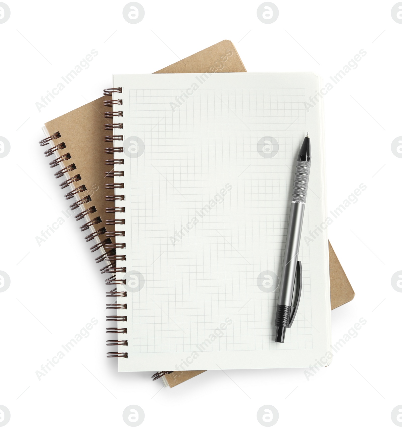 Photo of Two notebooks and pen isolated on white, top view