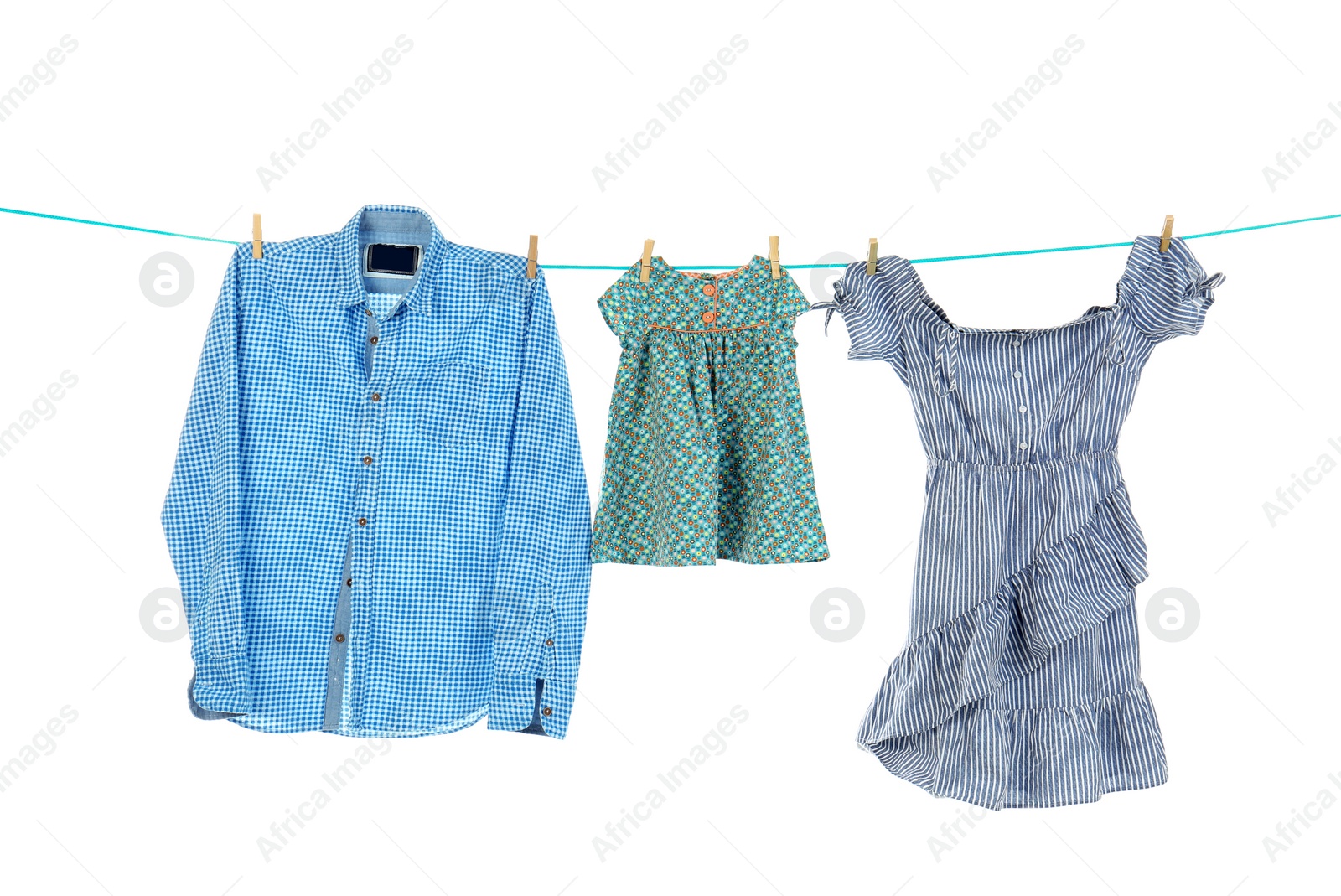 Photo of Clothes on laundry line against white background