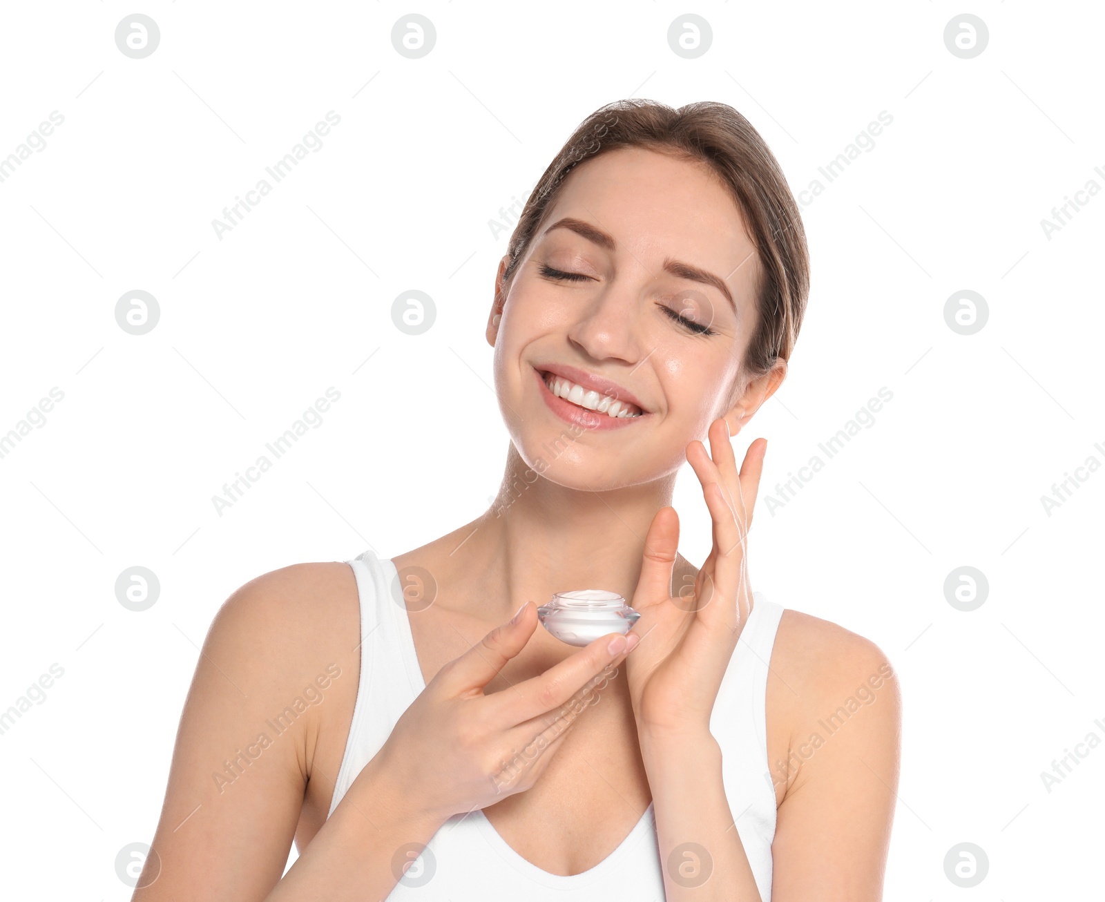 Photo of Portrait of young woman with jar of cream on white background. Beauty and body care