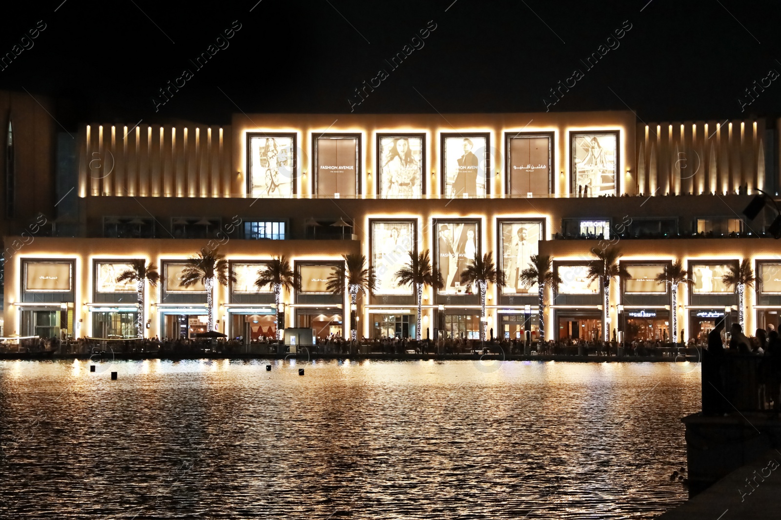 Photo of DUBAI, UNITED ARAB EMIRATES - NOVEMBER 04, 2018: Night cityscape with illuminated building