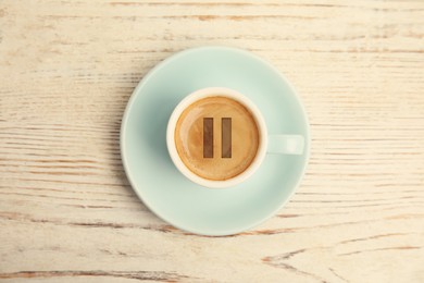 Image of Coffee Break. Cup of aromatic espresso on white wooden table, top view  