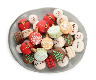 Photo of Beautifully decorated Christmas macarons on white background, top view