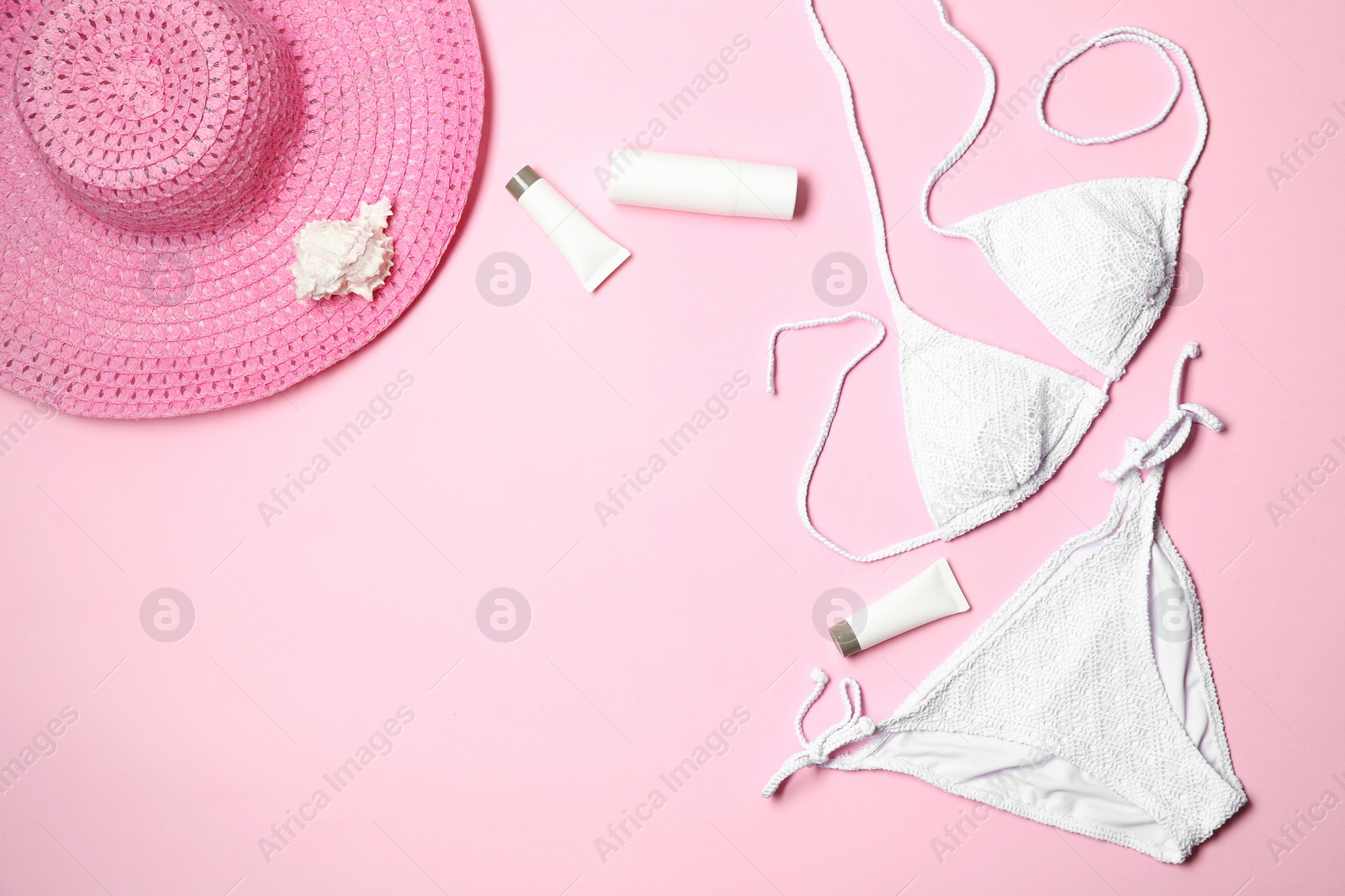 Photo of Flat lay composition with stylish bikini on color background. Space for text