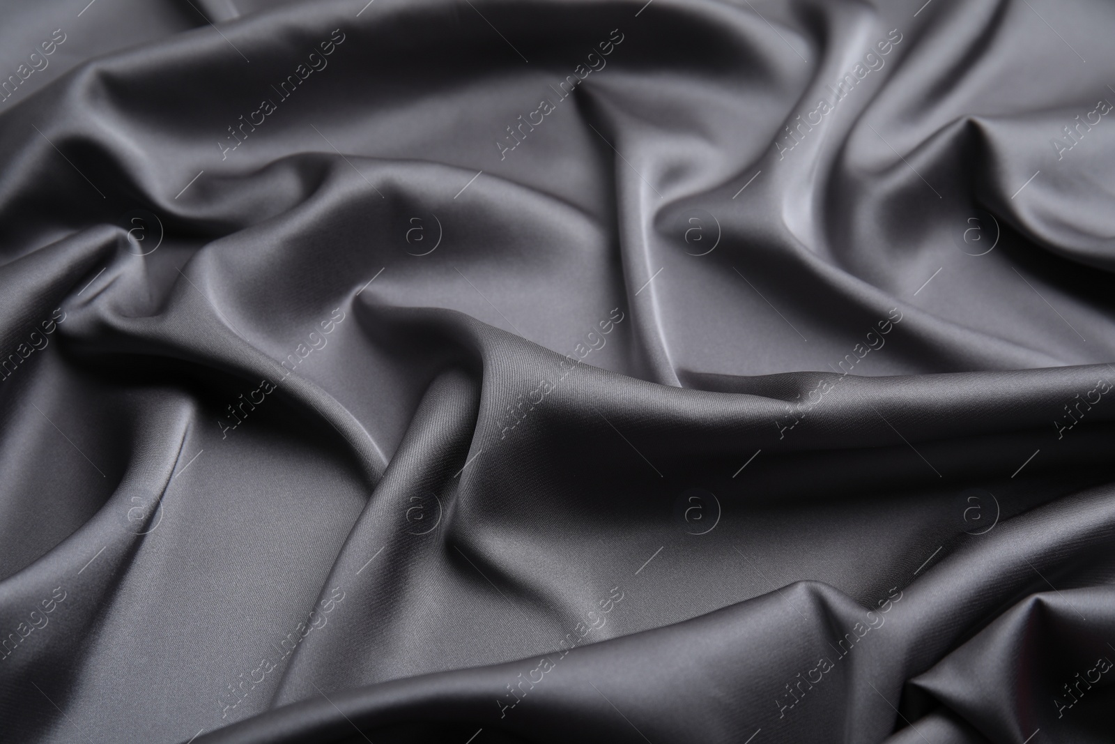 Photo of Texture of delicate black silk as background, closeup