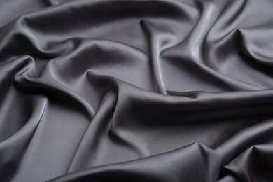 Texture of delicate black silk as background, closeup