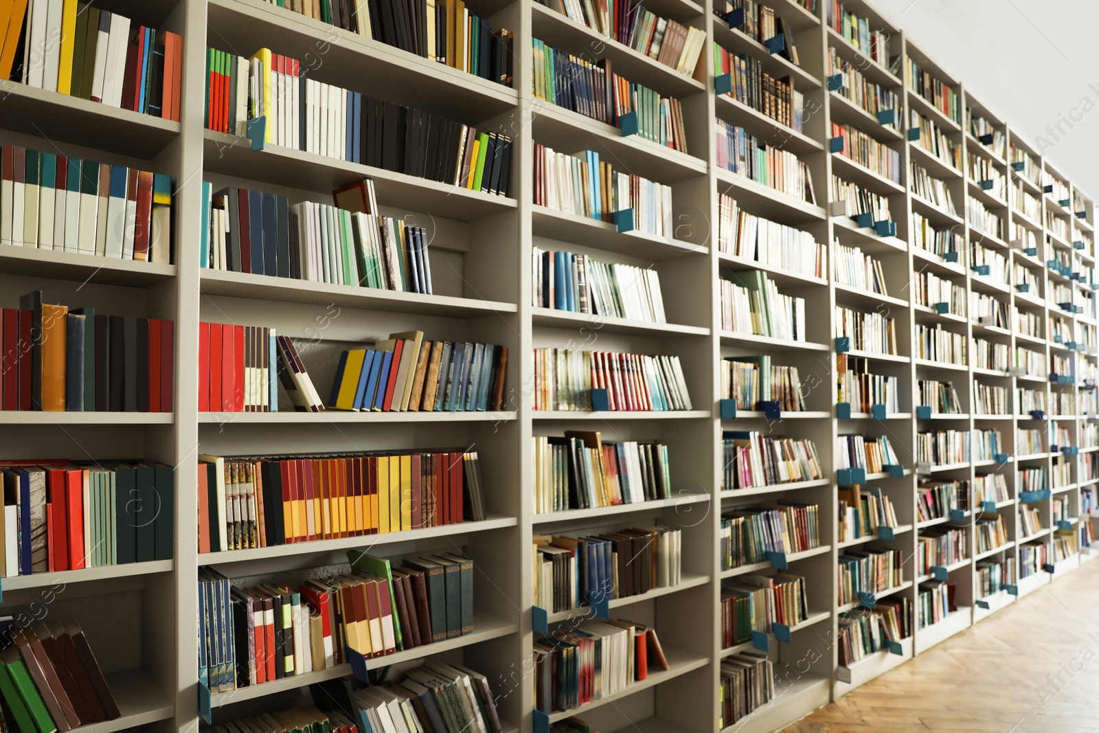 Photo of View of shelves with books in library