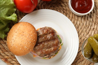 Photo of Tasty hamburger with patties, cheese and vegetables served on table, flat lay