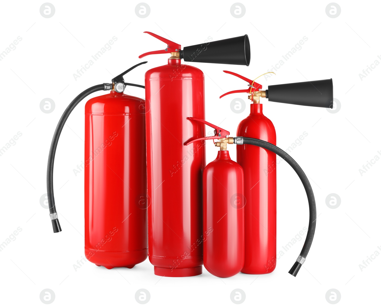 Photo of Many red fire extinguishers on white background