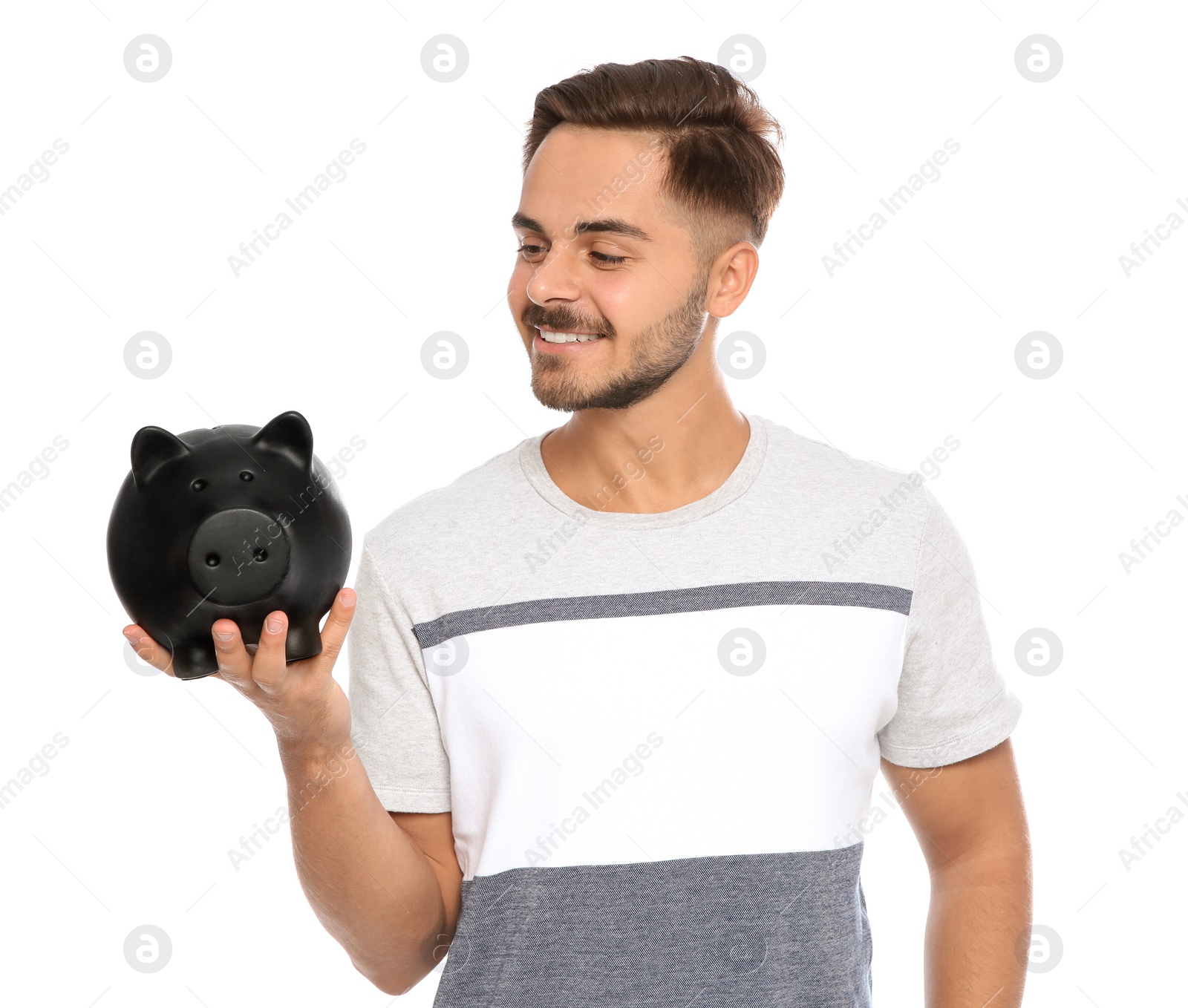 Photo of Portrait of young man with piggy bank on white background