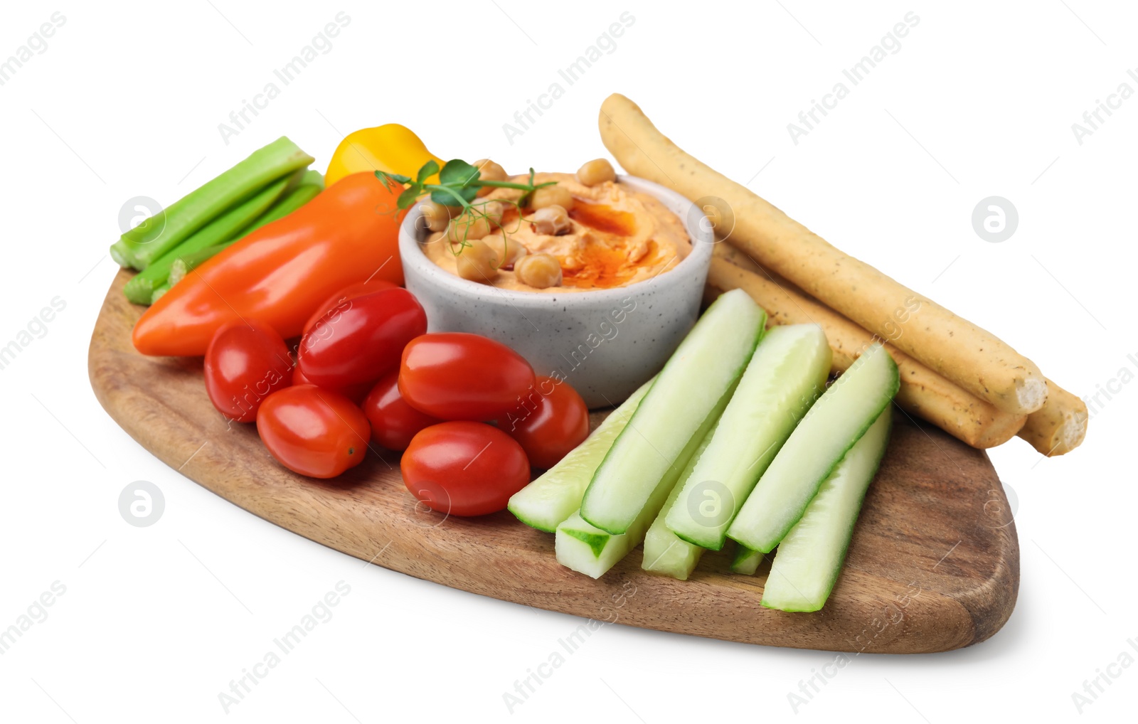 Photo of Board with delicious hummus, grissini sticks and fresh vegetables on white background