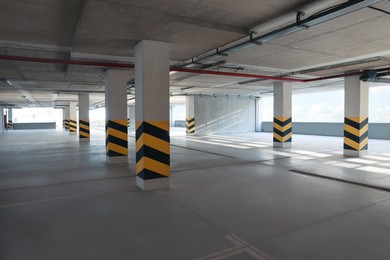 Photo of Open car parking garage on sunny day