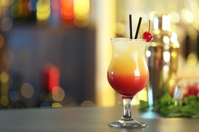 Photo of Just made appetizing cocktail Sex on the Beach in bar. Space for text