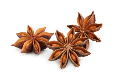 Dry anise stars with seeds on white background