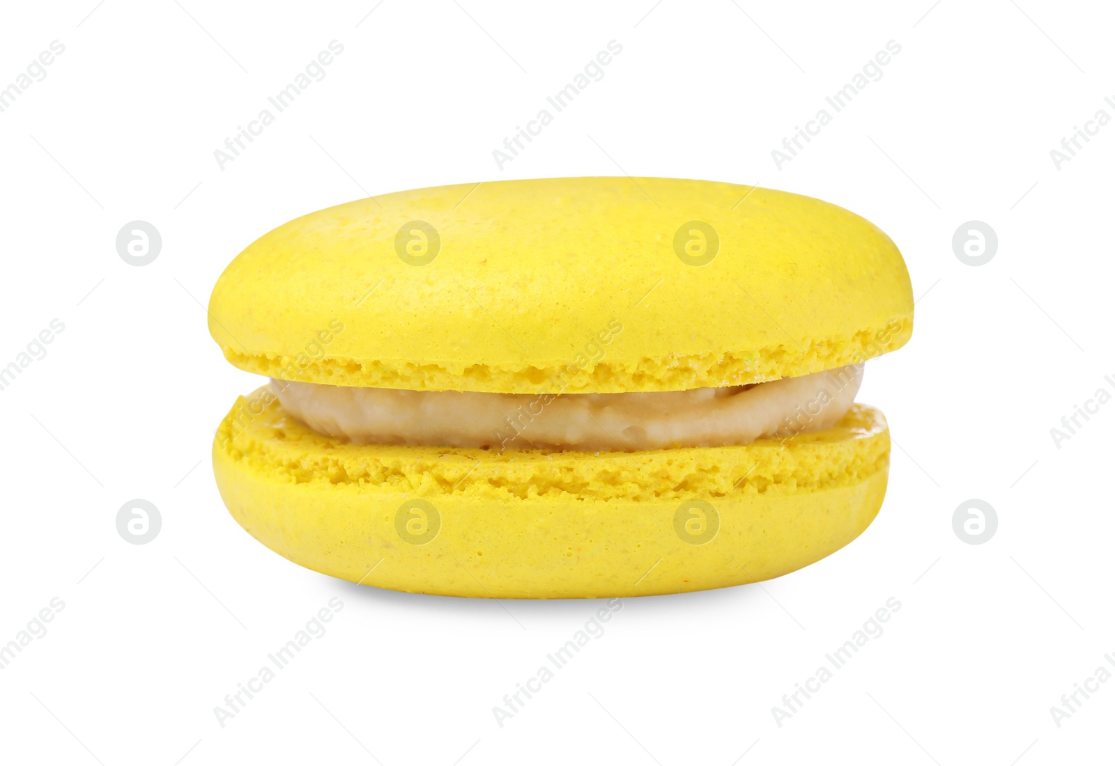 Photo of Yellow macaron isolated on white. Delicious dessert