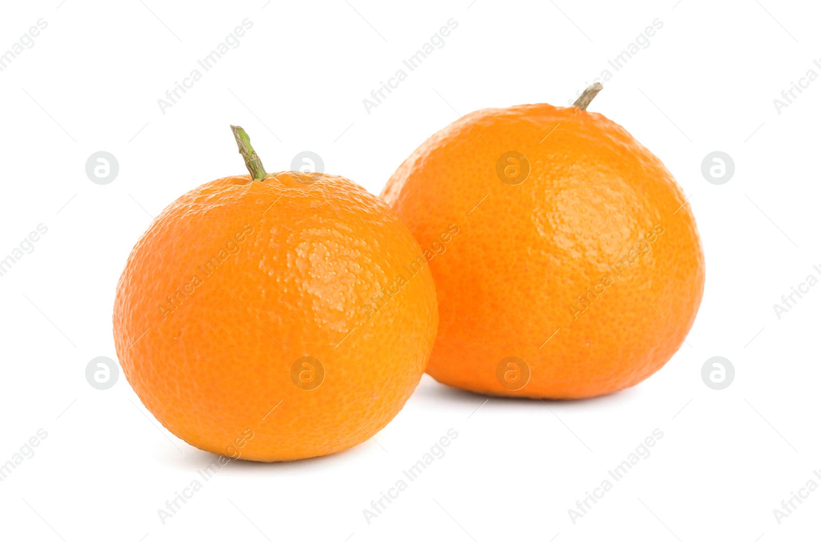 Photo of Fresh ripe juicy tangerines isolated on white