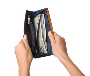 Photo of Young woman holding wallet with dollar bills on white background, closeup