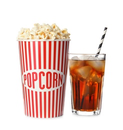 Photo of Cup with delicious popcorn and glass of cola on white background