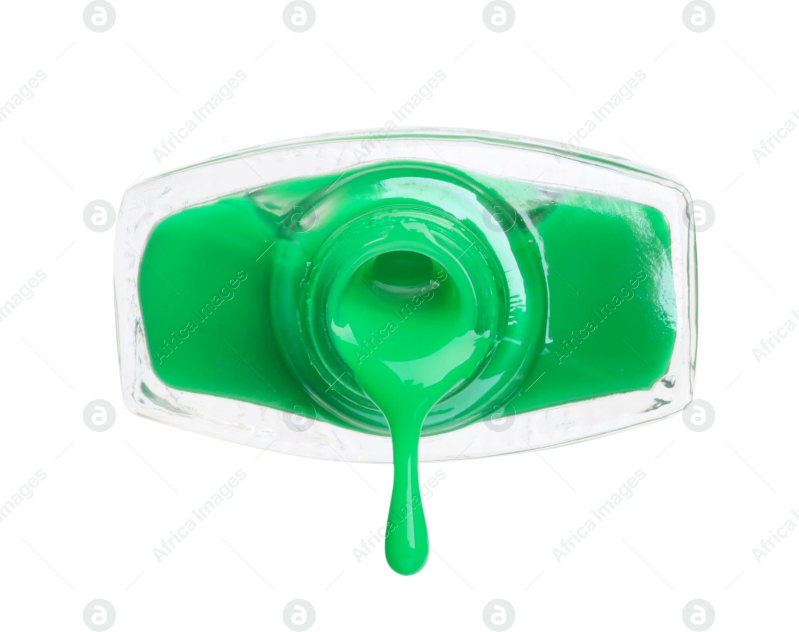 Photo of Green nail polish dripping from bottle isolated on white