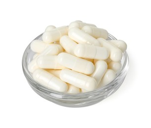Photo of Vitamin capsules in bowl isolated on white. Health supplement