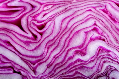 Photo of Fresh ripe red cabbage as background, closeup