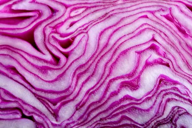 Photo of Fresh ripe red cabbage as background, closeup