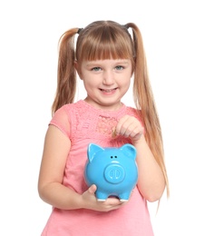 Photo of Portrait of little girl with piggy bank on white background