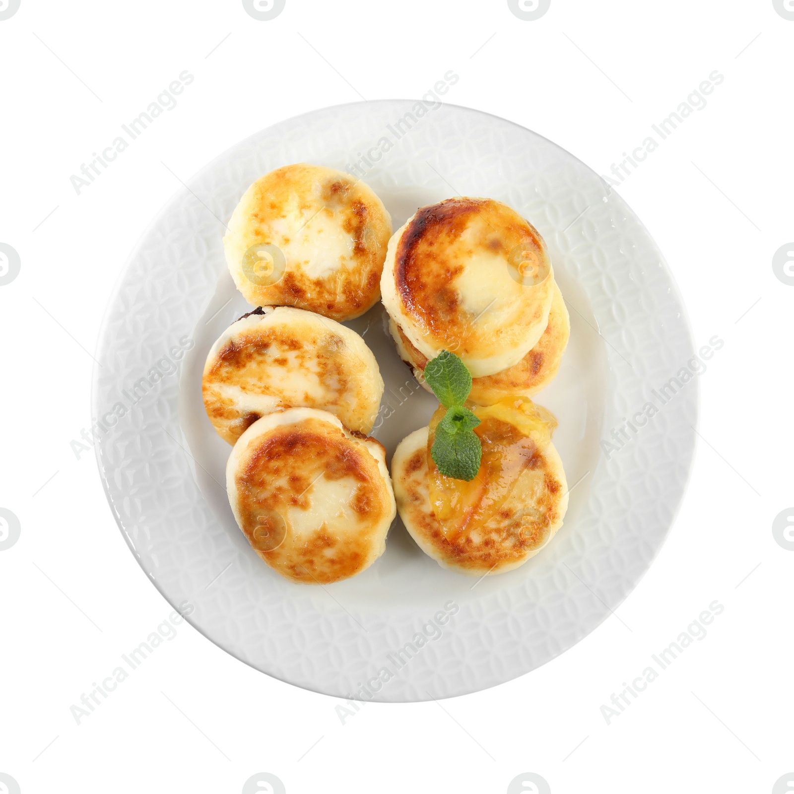 Photo of Delicious cottage cheese pancakes with mint isolated on white, top view