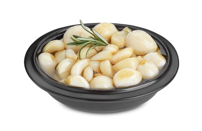 Photo of Peeled garlic cloves with honey and rosemary in bowl isolated on white