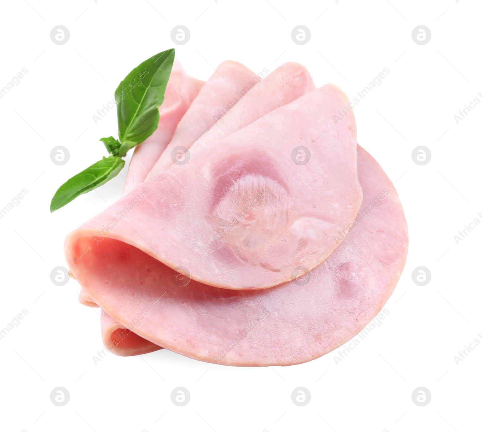 Slices of tasty ham and basil isolated on white Photo of Slices of tasty ham and basil isolated on white