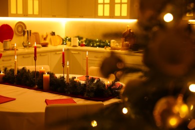 Cozy spacious kitchen decorated for Christmas. Interior design