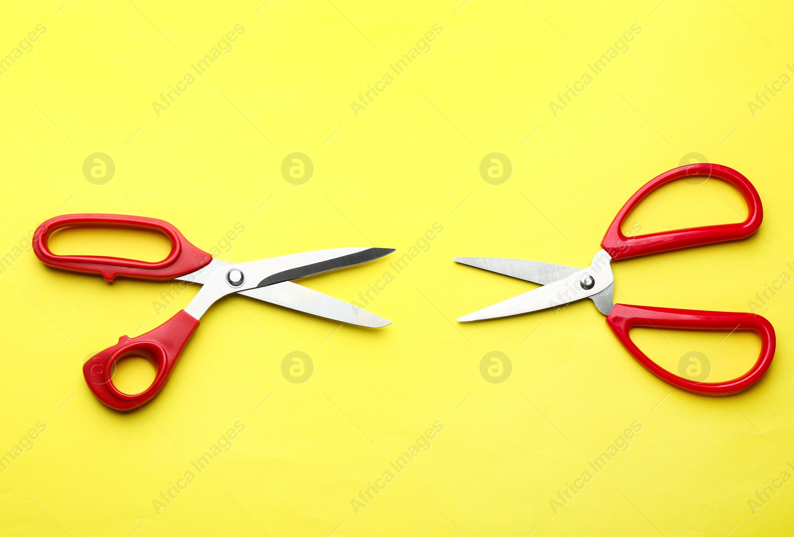 Photo of Different scissors on color background, flat lay