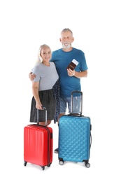 Photo of Senior couple with suitcases and passport on white background