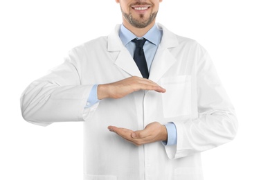 Photo of Male doctor holding something on white background, closeup