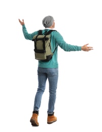Photo of Man with backpack walking on white background, back view. Autumn travel