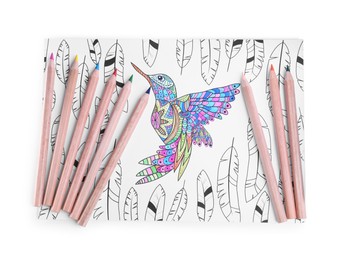 Photo of Antistress coloring page and pencils on white background, top view