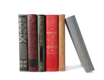 Photo of Stack of hardcover books on white background