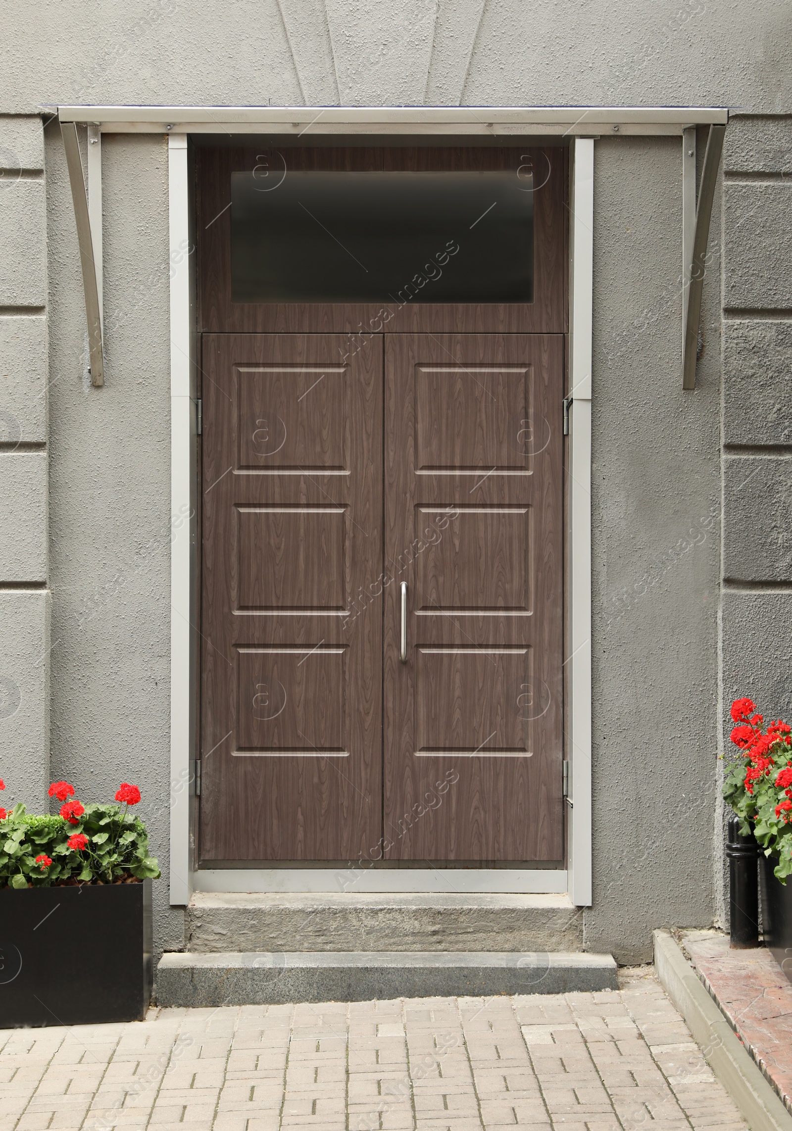 Photo of Building with modern front door. Exterior design