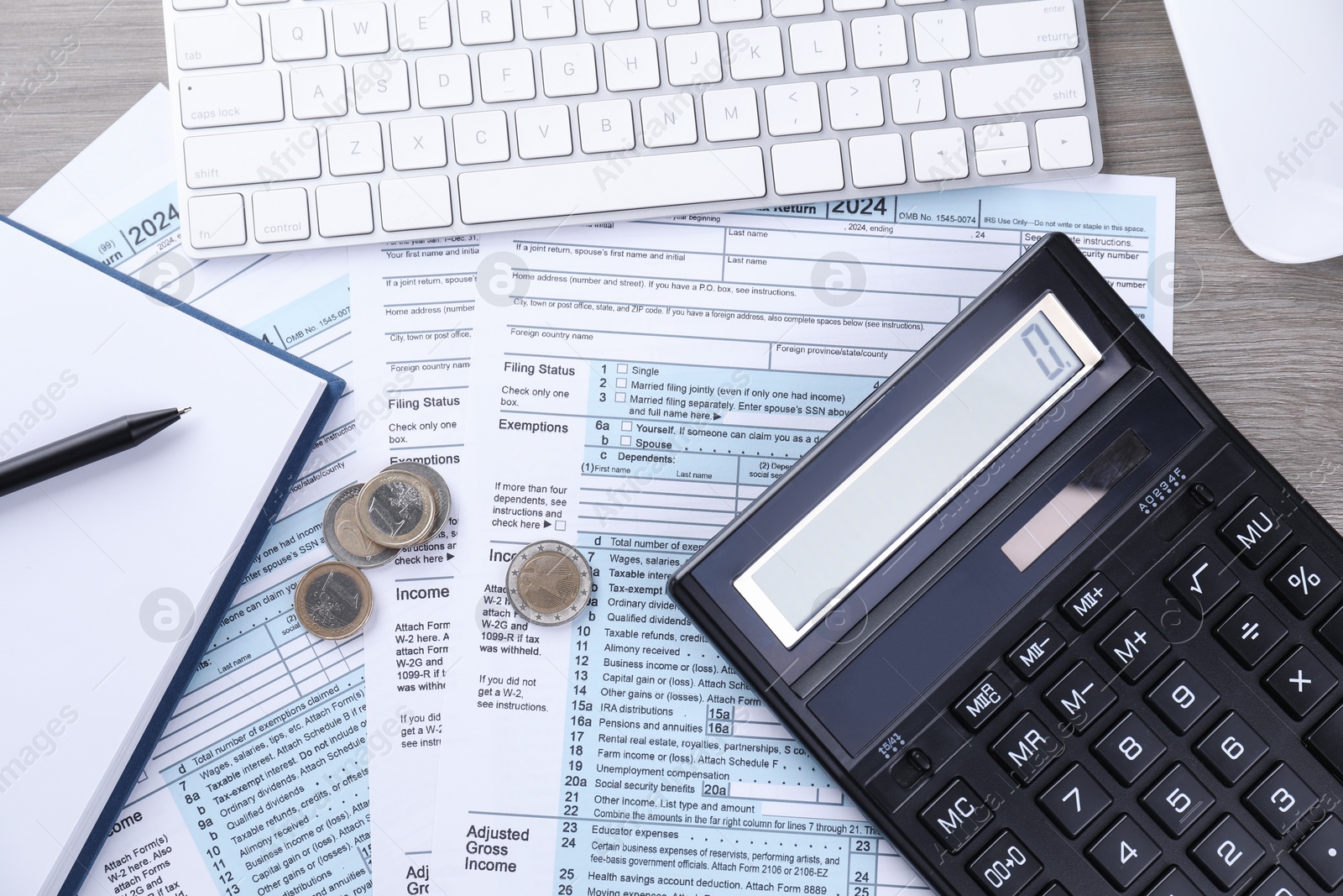 Photo of Tax accounting. Flat lay composition with calculator and documents on wooden table